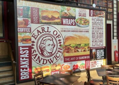 Habillage d’un mur pour le restaurant Earl Of Sandwich Disney Village